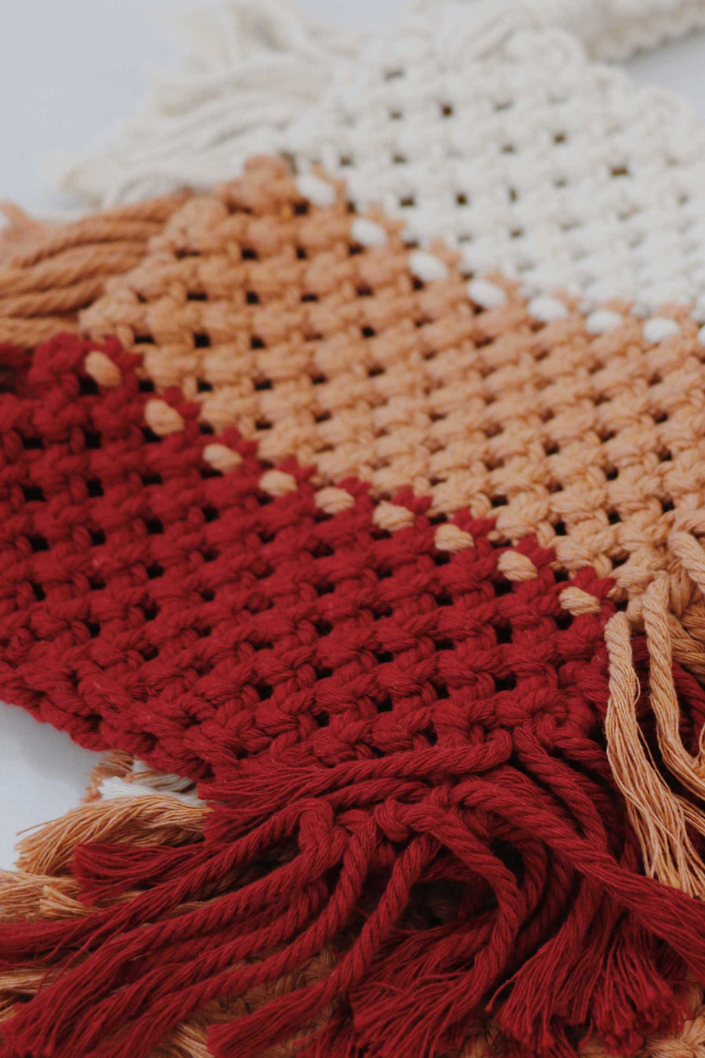 Crochet bag, made with recycled cotton yarn with stripes white, tan and burgundy.