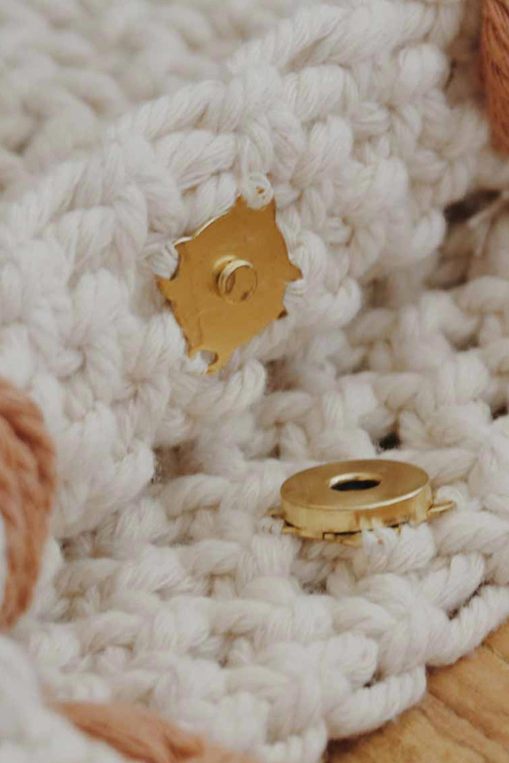 Crochet bag, made with recycled cotton yarn with stripes white, tan and burgundy.