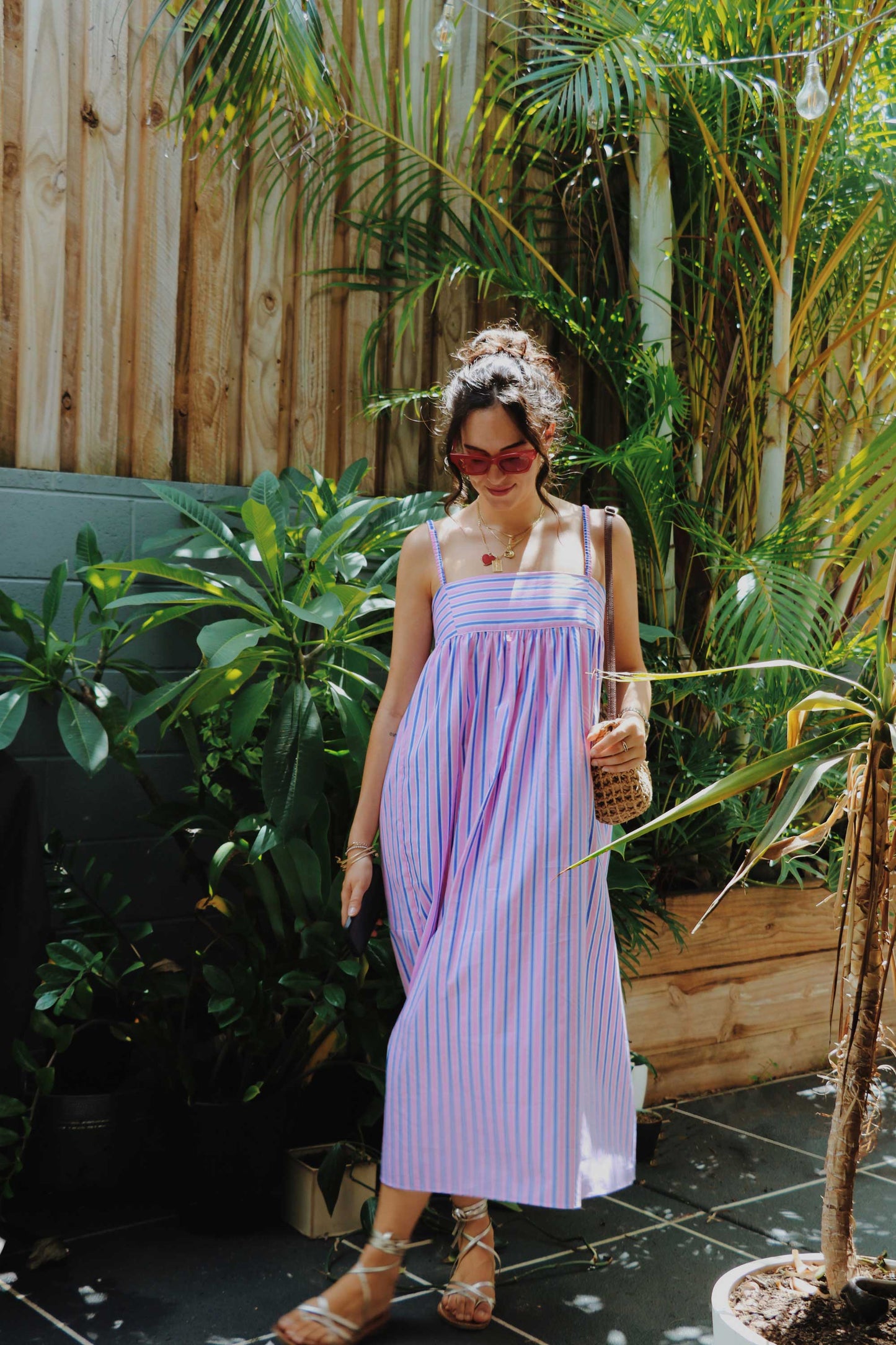 Maxi dress in pink, blue, white stripes.