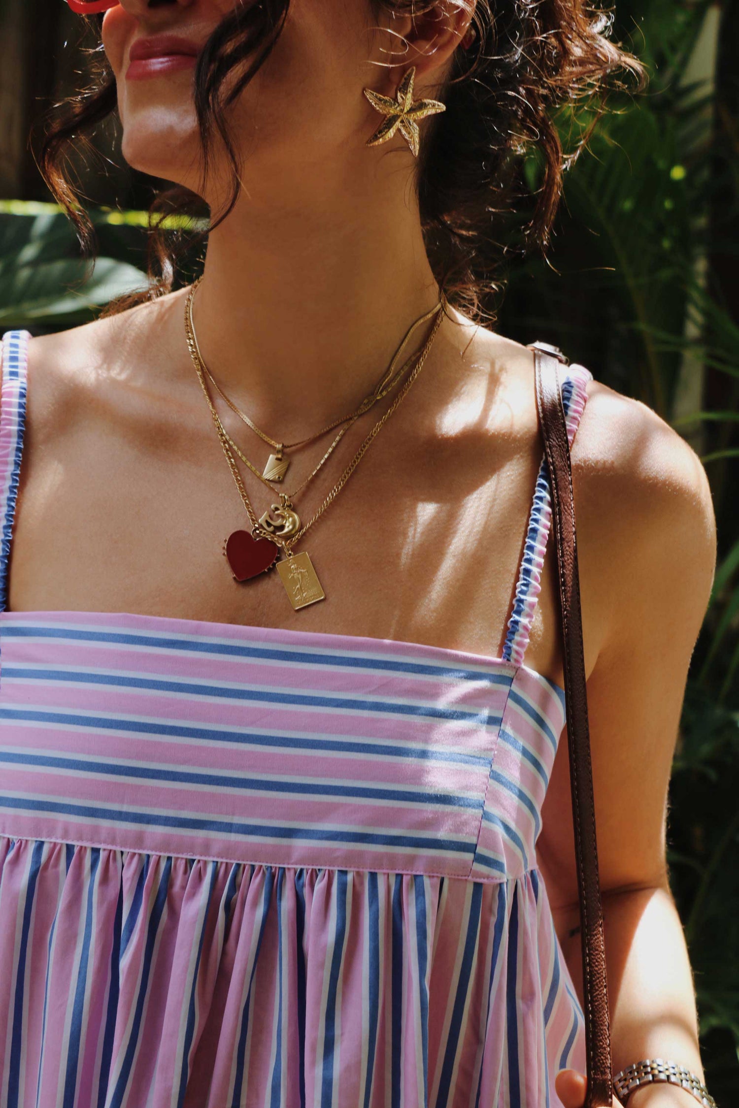 Maxi dress in pink, blue, white stripes.