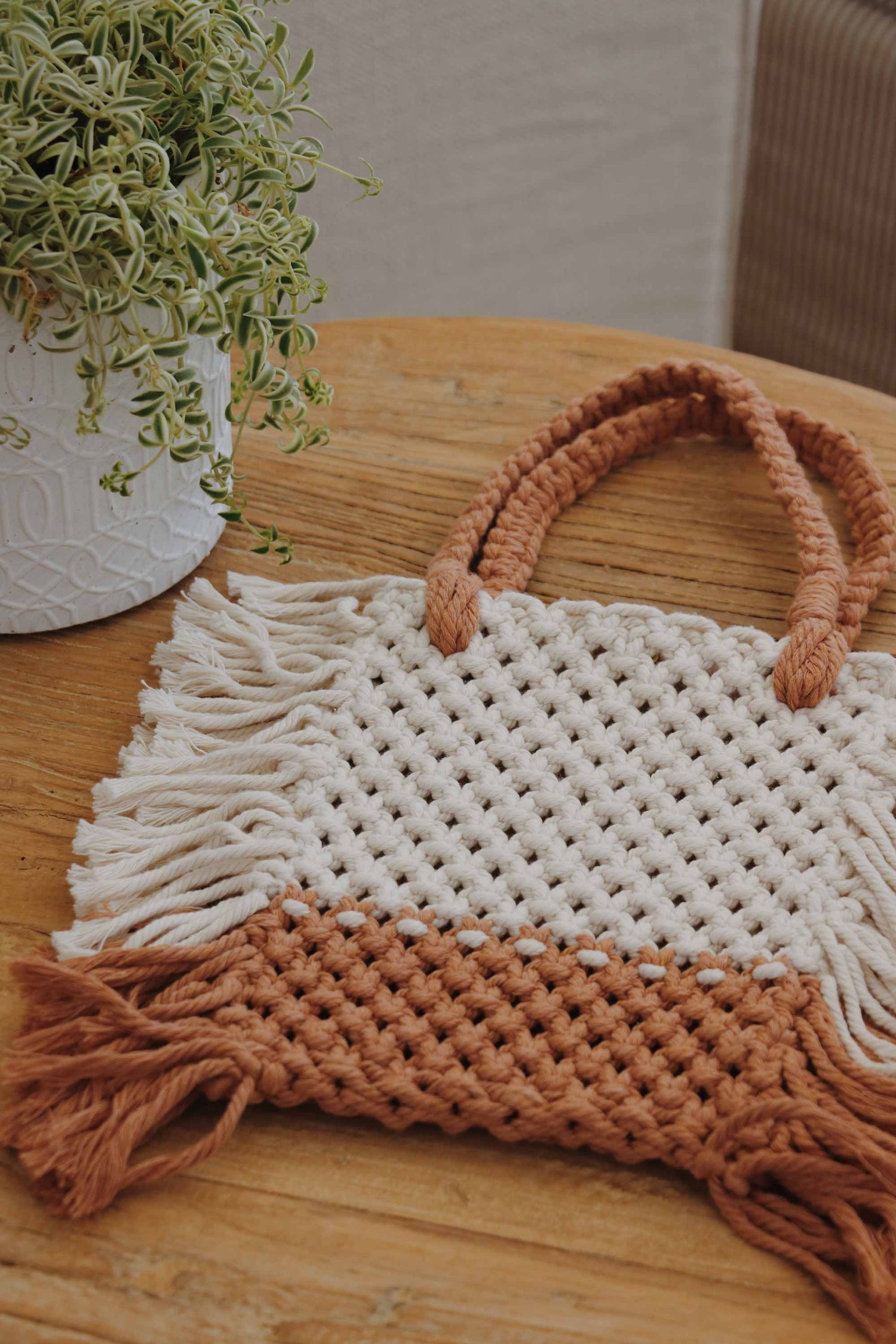 Crochet bag, made with recycled cotton yarn with stripes white and tan.