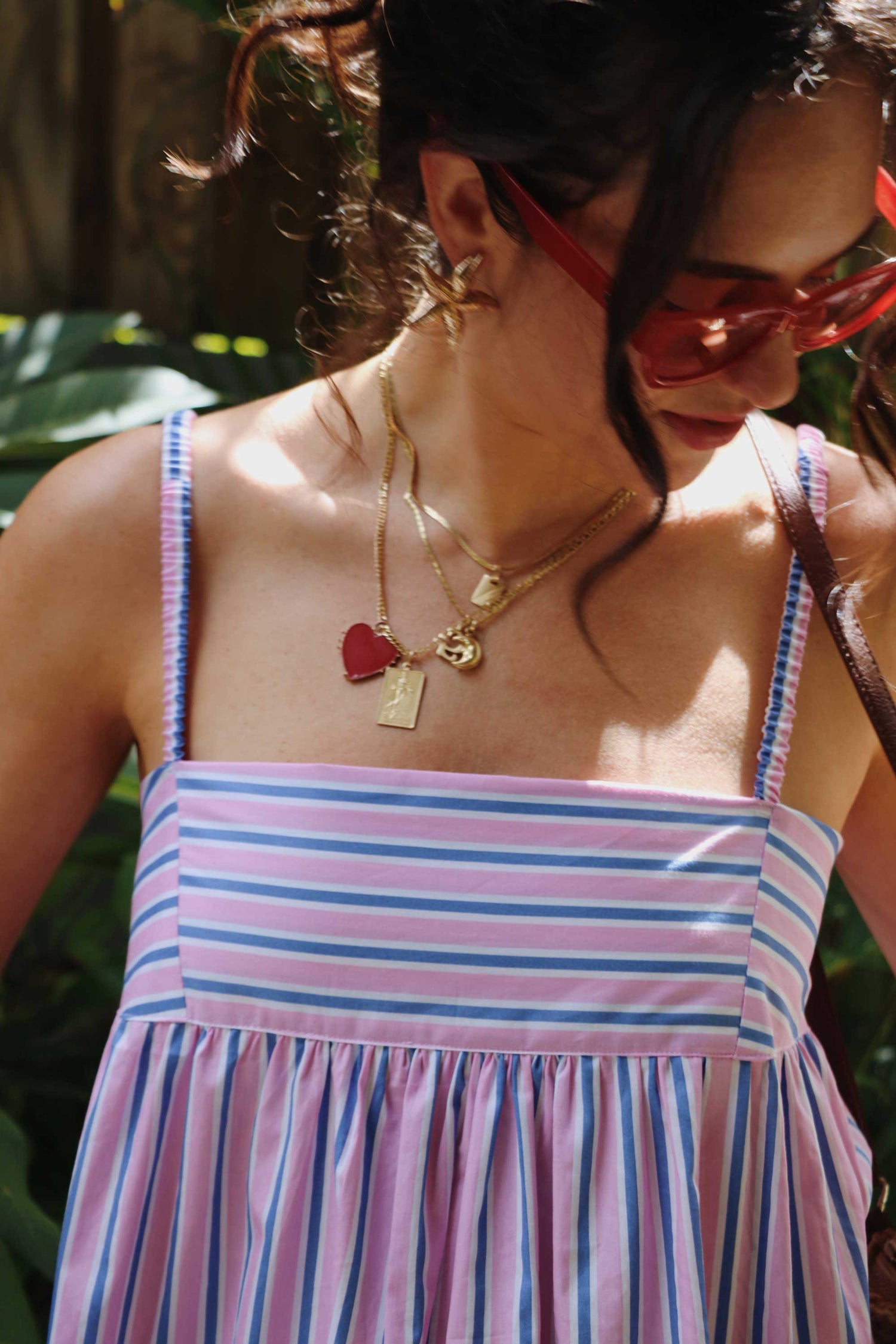 Maxi dress in pink, blue, white stripes.