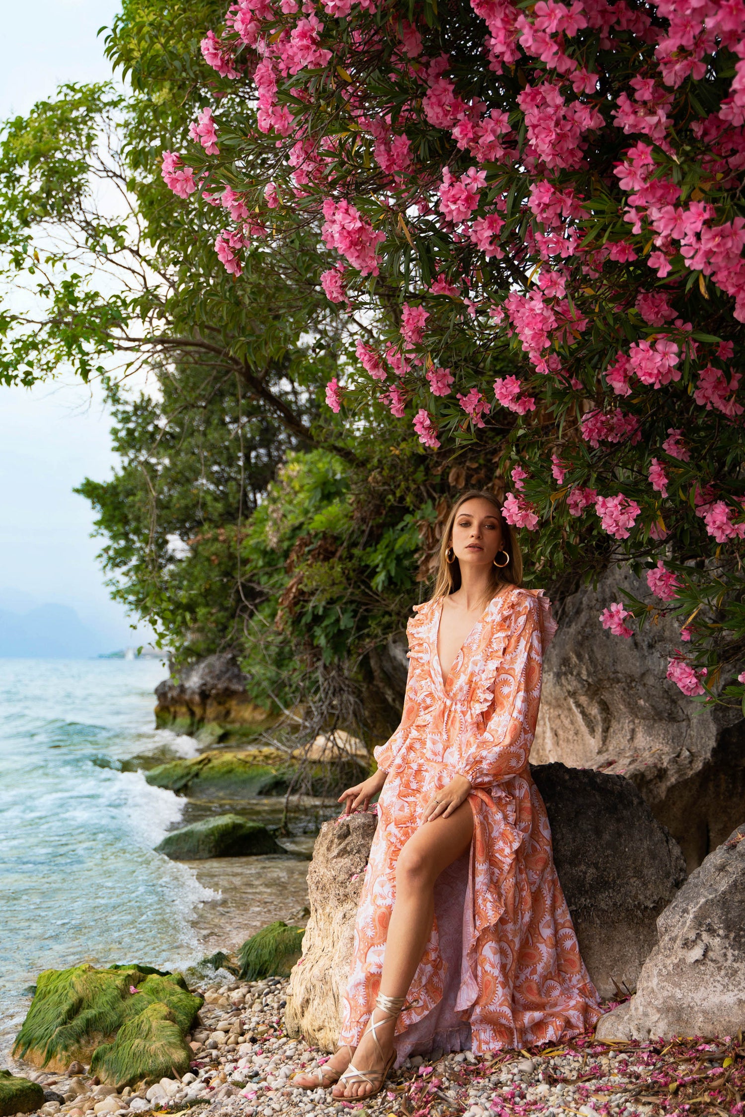 Floral paisley printed linen maxi dress, with long puff sleeves, slit and open back.