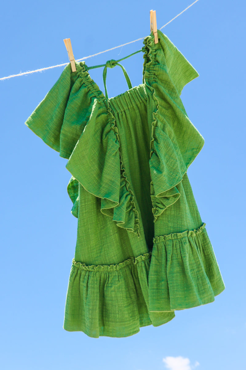 Full figure green flowy dress for girls, doble cotton gauze sustainable fabric.