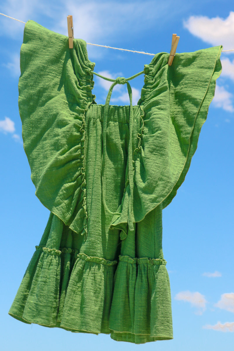 Full figure green flowy dress for girls, doble cotton gauze sustainable fabric.